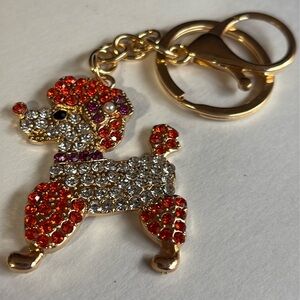 Sparkling poodle dog Keychain with orange Accents